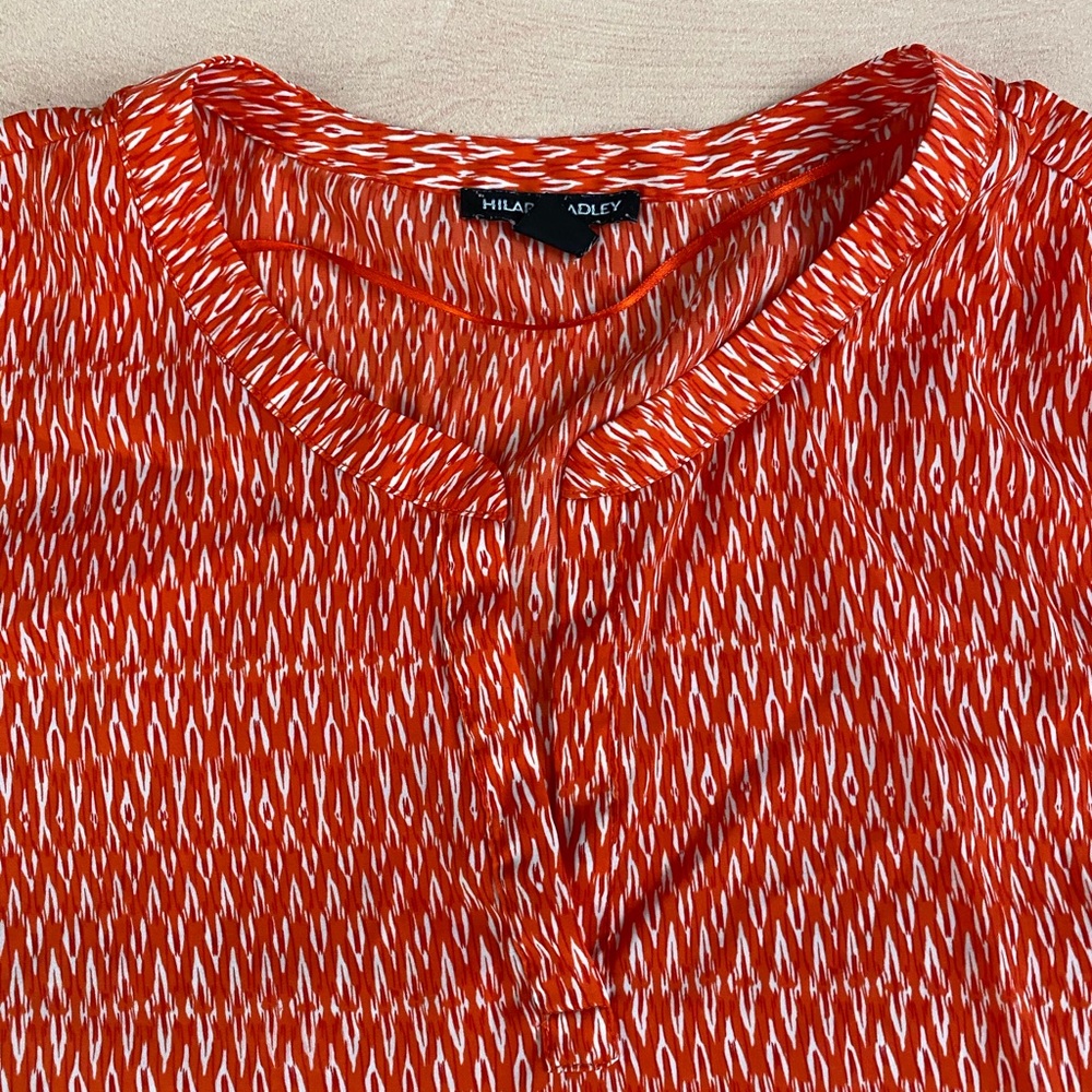 Hilary Radley orange and white sleeveless blouse